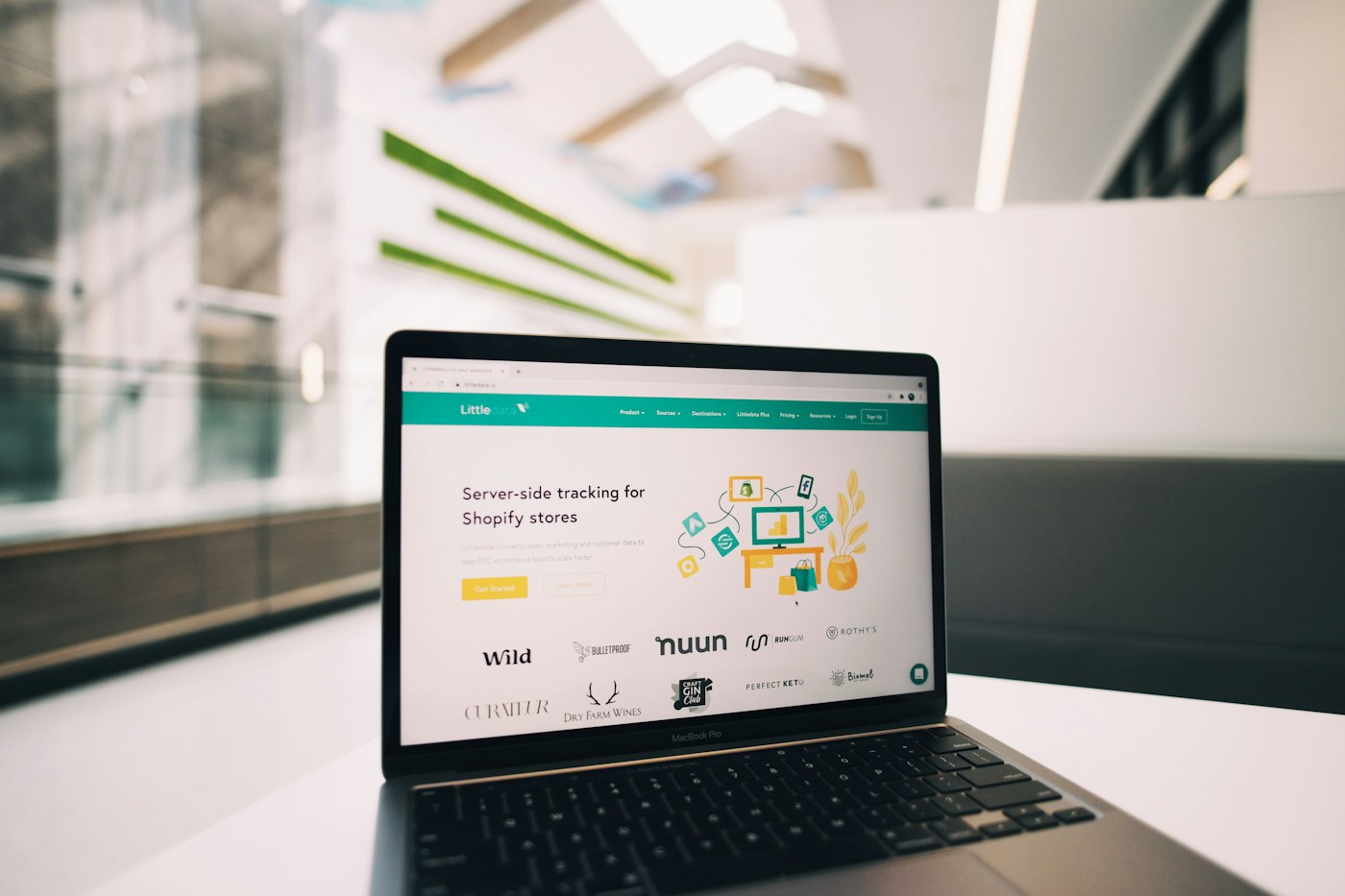 Illustrative laptop photograph, not a client advertising dashboard